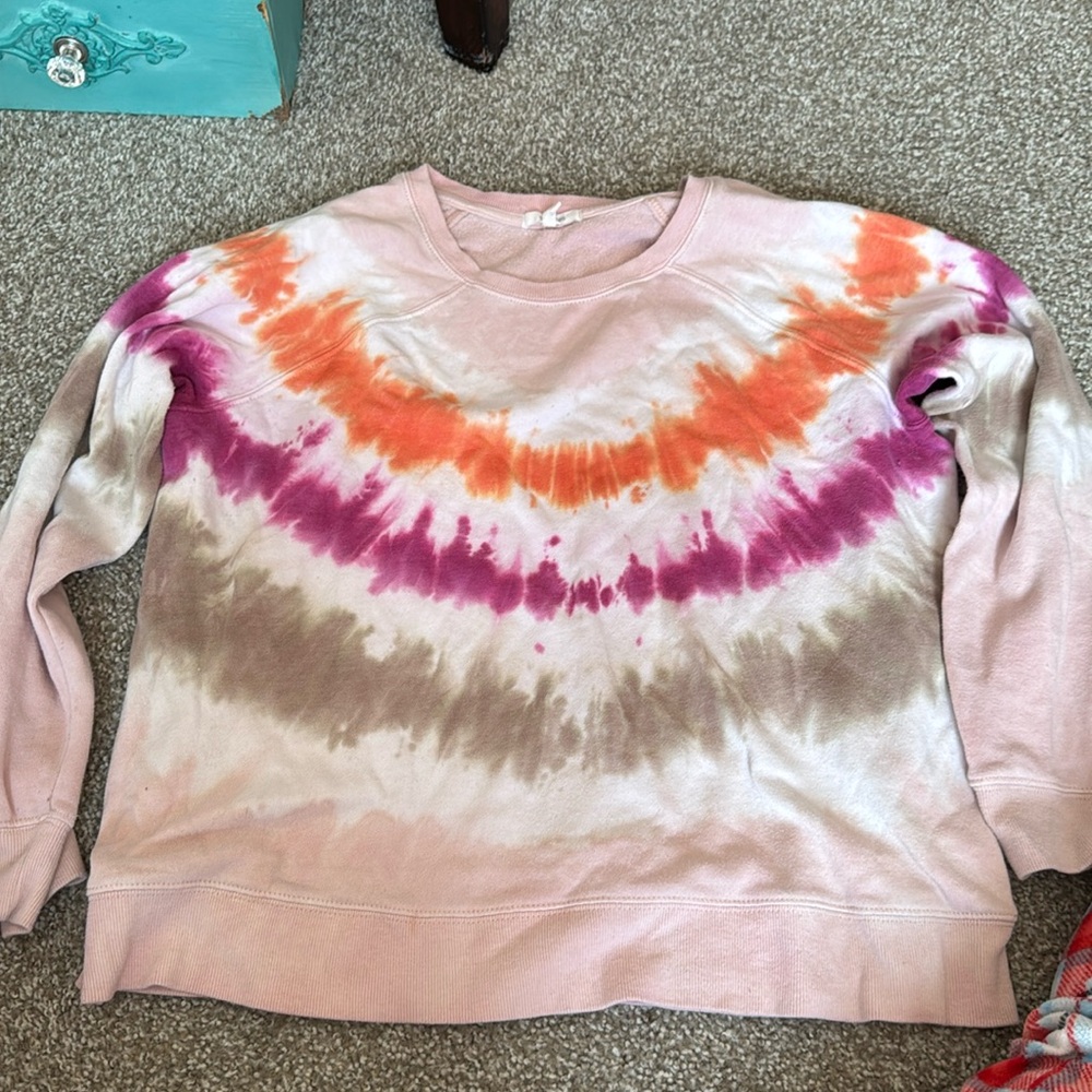Maurice’s tie-dye sweatshirt.